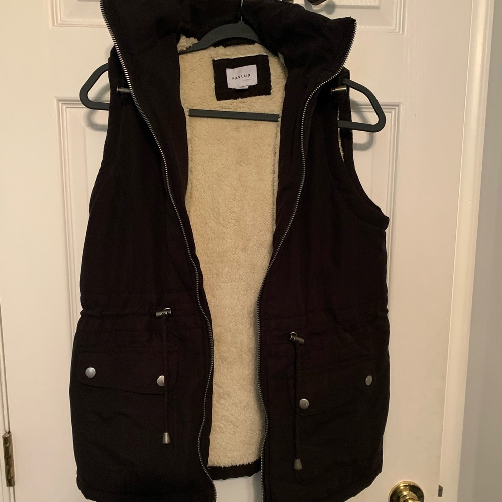 Hooded vest.
